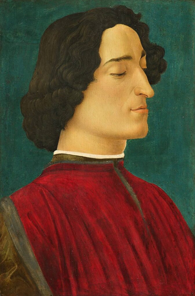 Botticelli portrait of Giuliano de Medici in profile with red garment